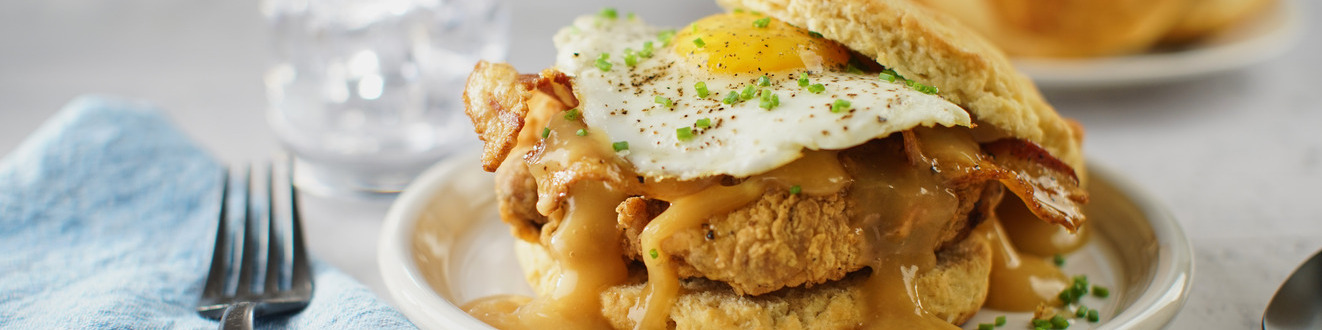 Fried Chicken Breakfast Sandwich on Biscuit with Fried Egg