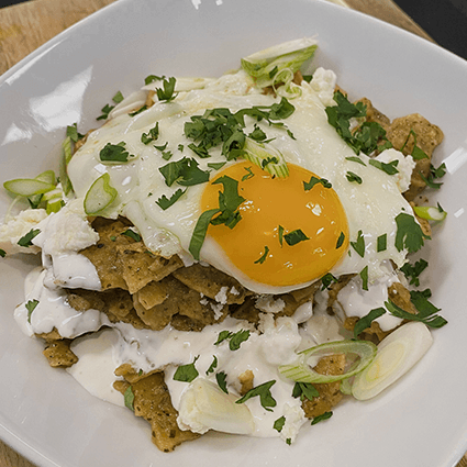 Green Chilaquiles in a Roasted Tomatillo Serrano Sauce