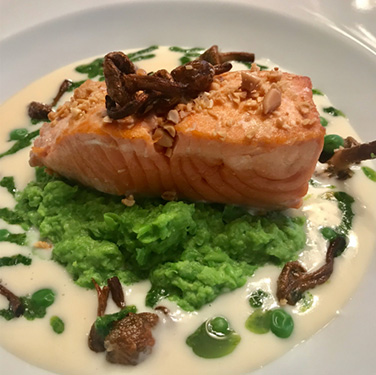 Pine Nut Dusted King Salmon with Beurre Blanc, Truffle Scented Pea Tip Puree and Yorkshire Caviar