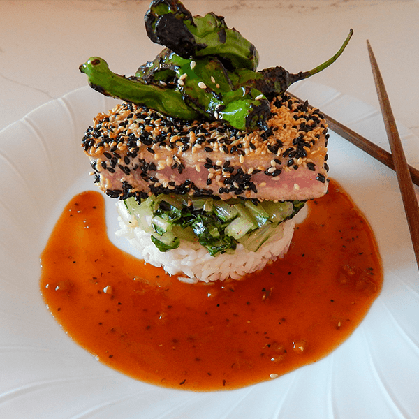 Sesame-Crusted Ahi with Jasmine Rice, Blistered Shishito finished with Wasabi Ginger Ponzu