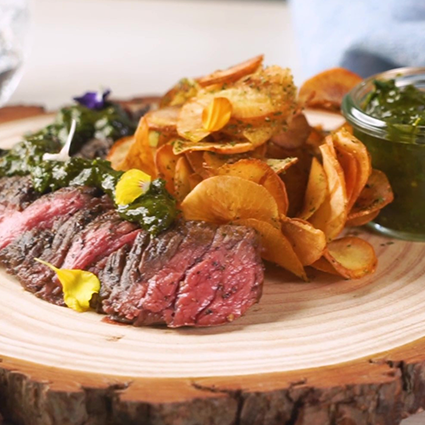 Grilled Skirt Steak with Moringa Salsa Verde and Fennel Pollen Yucca Chips
