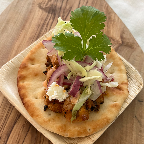Chicken Tikka Masala Naan with Spicy Harissa Yogurt Crema