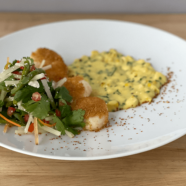 Pan-Seared Chicharrons and Cornmeal-Crusted Day Boat Scallops with Elote Hollandaise