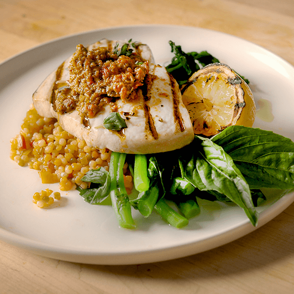 Woodfire Grilled Swordfish with Sun-Dried Tomato and Calabrian Chile Pesto